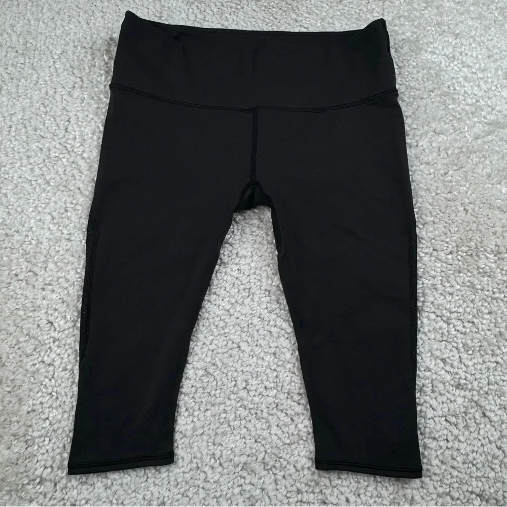 Lululemon Reveal Crop in Black. Mesh Sides. Size 12 or XL